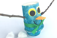 Crafted a whimsical blue snowman tree using paper cups and cotton balls! Adorned with a carrot nose, button eyes, and a top hat. 