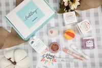 Autumn Vibes Bath Bevy Subscription box with bath bombs, whipped soap scrub, bath salt shots, bubble bath jug and loofah soap
