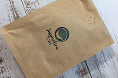 - ActionPlanner 
- 12oz Bag of Coffee 
- Coaster 
- Candle
- Pen 

*Items varies and theme changes. 