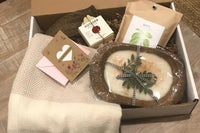 Our first box included a handmade candle and soap, basil growing kit, fingerless gloves, Turkish towel, linen apron and a card.