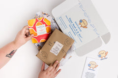 Read It & Eat Blind Date with a book.  Each box contains a food story, an artisanal snack, and a $5 donation to fight hunger in Buffalo, NY