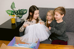 Girls and boy with tutu