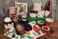 The 2022 Holiday Box: Set of 4 marshmallow mini mugs, handmade hot cocoa mix, a body butter, a tea light set and winter gloves.
