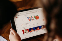 Children looking at Wiggle Worms YouTube channel to follow along online. Each kit has every activity recorded. For kids ages 3-5.