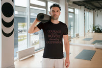 A man in a yoga studio carrying a yoga mat and wearing a tshirt inspired by Harry Potter with words like Courage, Bravery, and Gryffindor.
