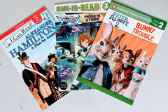 Three colorful children's books from the Kids Read Daily Book Club: "My Family and Me," "The Thrifty Guide to Ancient Rome," and "Freddie Mole, Lion Tamer"