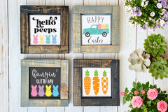 Brown and gray wood framed signs in various designs. Hello peeps, carrots design, and vintage truck easter signs.