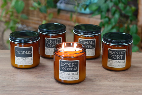 Each candle is double wicked and in a 16oz amber glass jar with a black metal lid and a wax weight of 13oz.