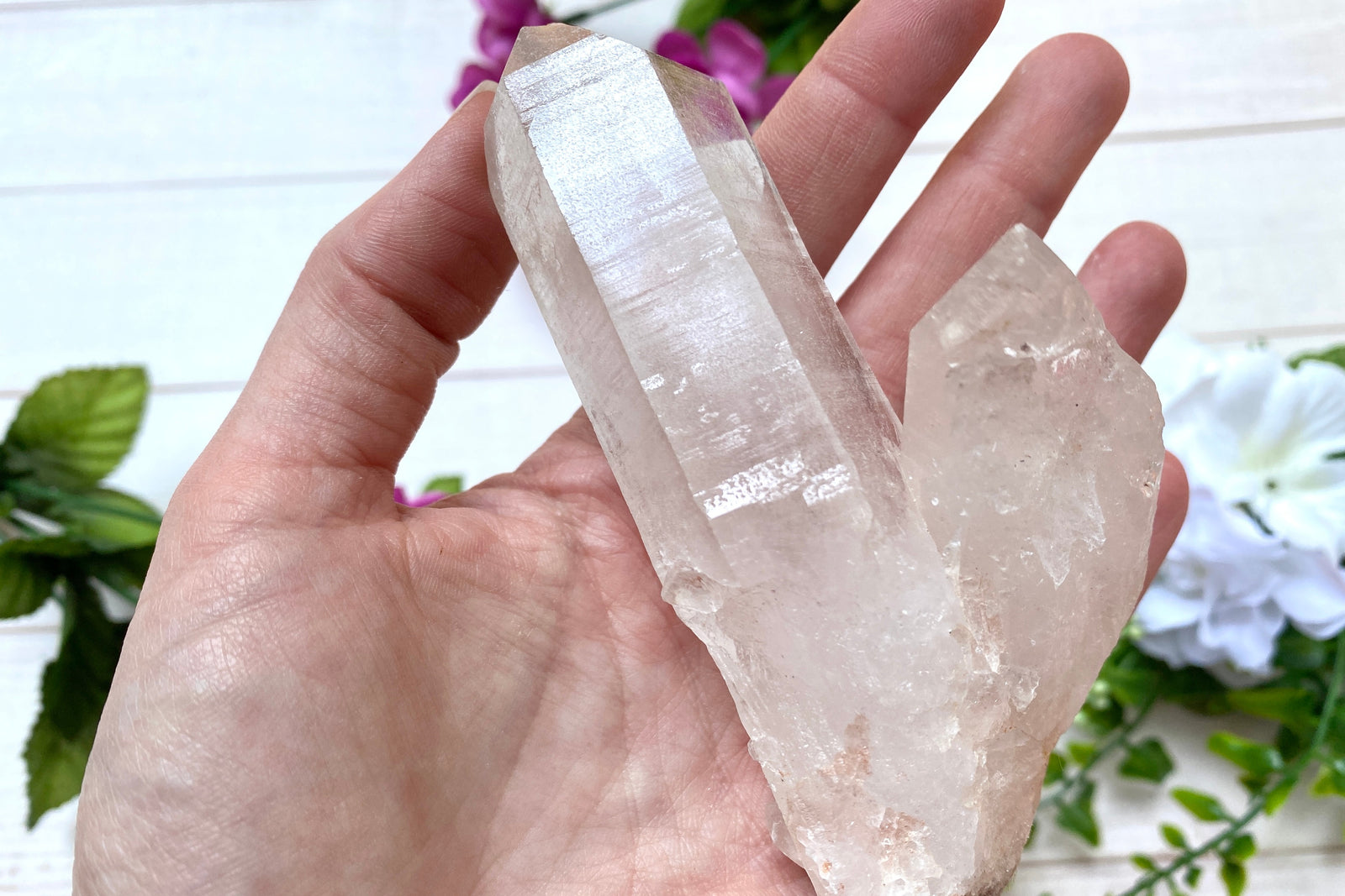 Photo of a Himalayan quartz cluster offered by Soul Gifts Crystals as an example of a Crystal of the Month.